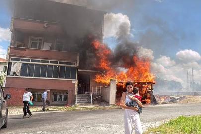 Alevler binanın garajını sardı, kardeşini kucağına alıp dışarı kaçtı